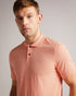DELVIN-Tops-Dive into DELVIN. This essential polo shirt covers all the bases with a flattering fit, collar, and short sleeves. Paired with jeans and trainers, this top is perfect for spontaneous visits to the farmer's market or can be dressed up with tailored trousers and boots for a smart-casual look. By choosing Ted Baker cotton products, you're supporting our investment in the Better Cotton Initiative's mission. This product is sourced via a system of mass balance and therefore may not contain better cot